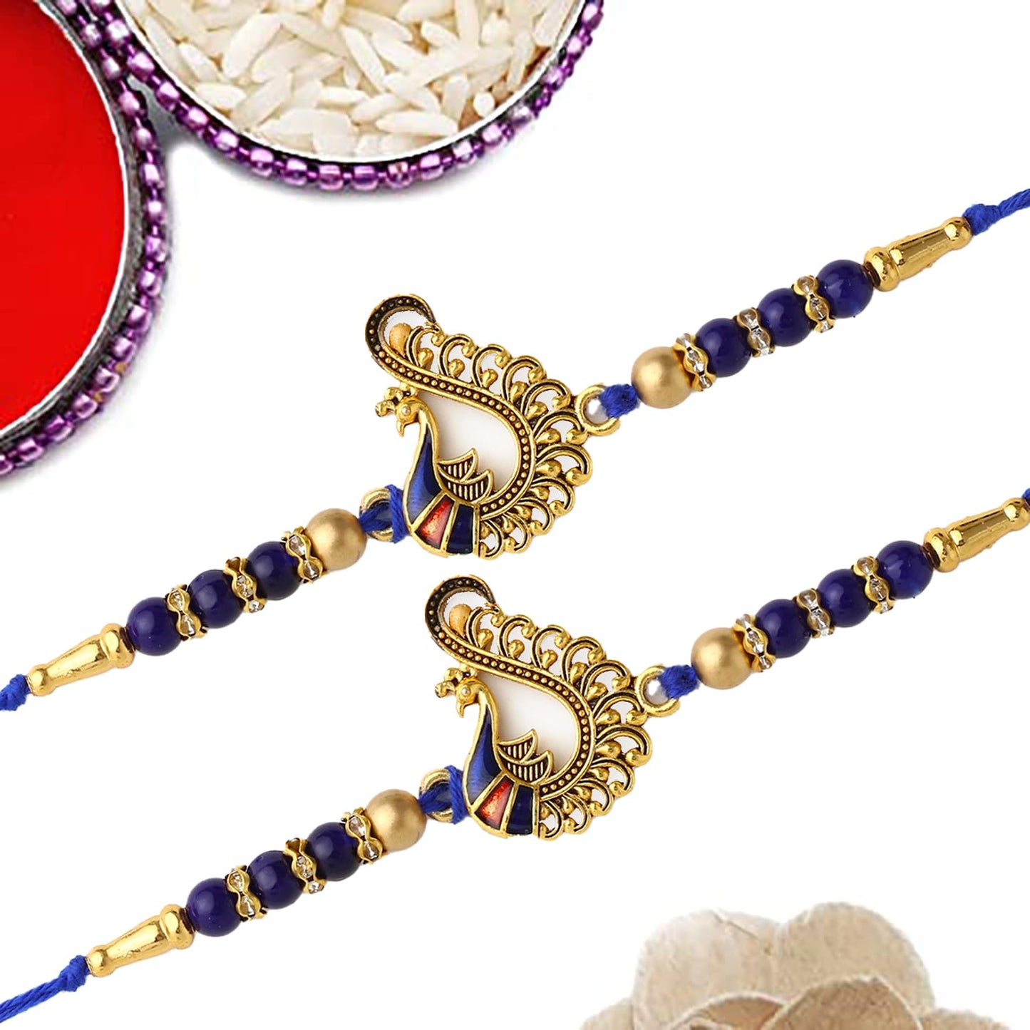 Traditional rakhi with blue beads and gold, a cherished symbol of love and unity during Raksha Bandhan.