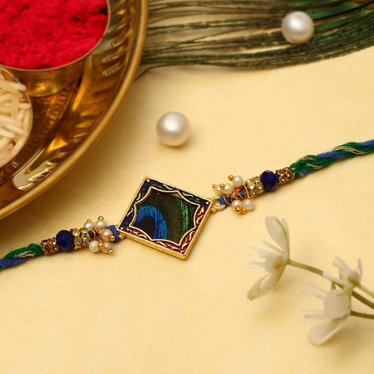 Colorful rakhi with gold and blue bead, symbolizing love and protection during the festival of Raksha Bandhan
