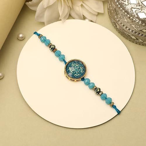 Fashionable blue and white bracelet with a dazzling blue stone, a must-have piece for your jewelry box.