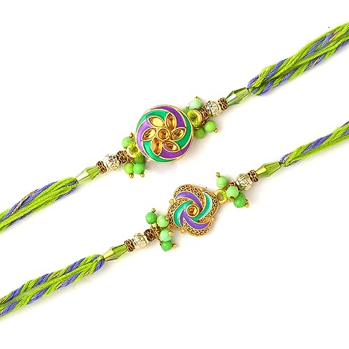 Green and purple rakhi's with a gold chain, a symbol of love and protection exchanged during Raksha Bandhan.