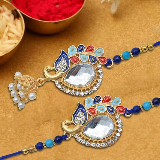 Two rakhi with blue and gold beads for Bhaiya Bhabhi Rakhi celebration.