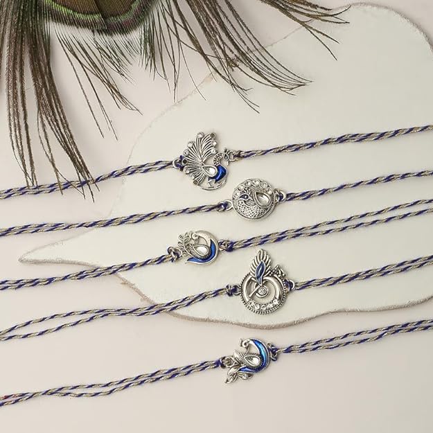  Four silver and blue rakhi , perfect for celebrating Raksha Bandhan with style.