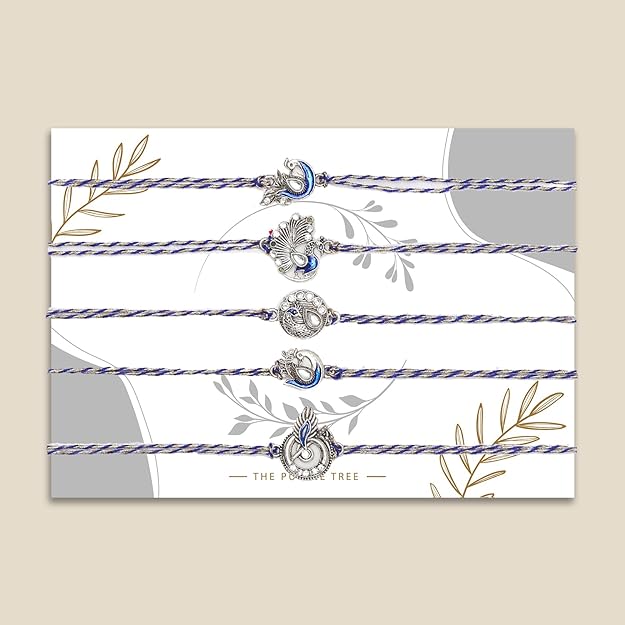  Beautifully crafted silver and blue rakhi , symbolizing the bond between siblings, in a set of four.