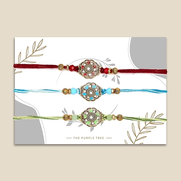 Three colorful rakhi's with gold and green beads