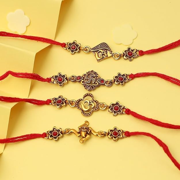 Four rakhi with gold and red beads, symbolizing love and protection during the festive season.