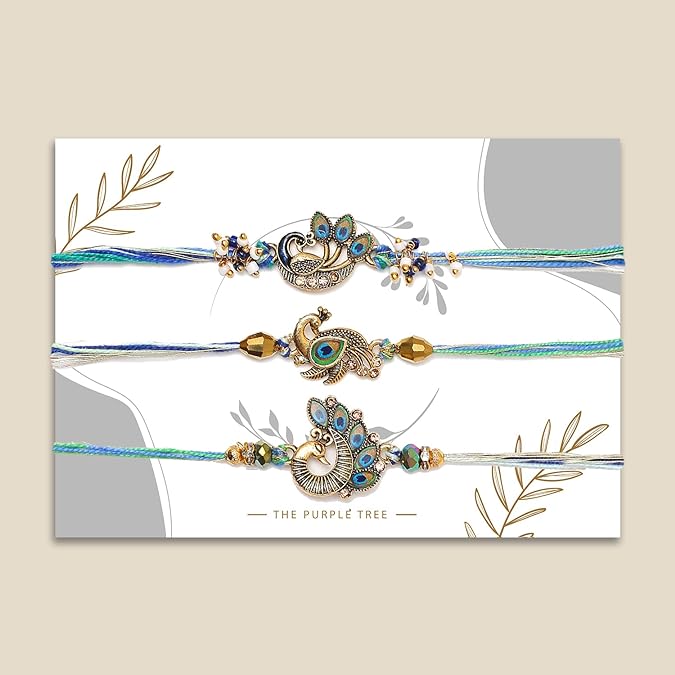 Three peacock-designed rakhi's for the festival of Raksha Bandhan.