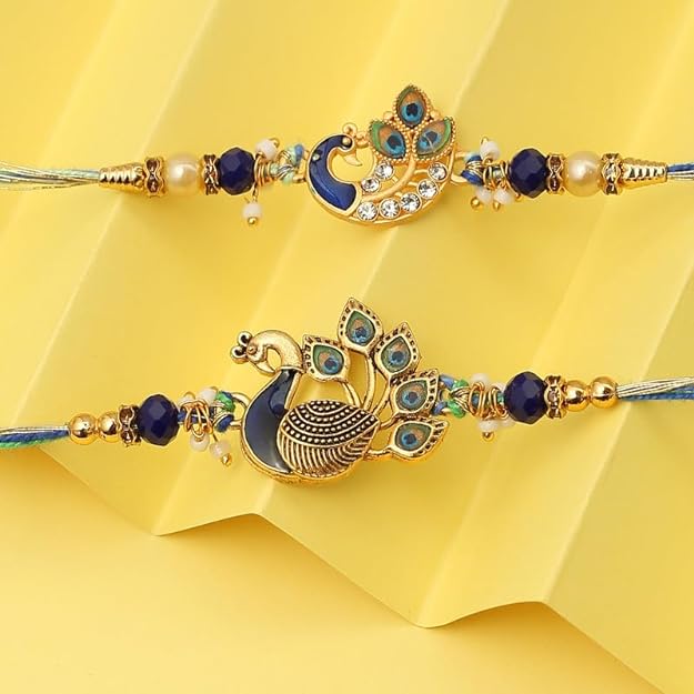 Two beautiful rakhi bracelets with a peacock design and gold plated beads. Perfect for celebrating the bond of love and protection.