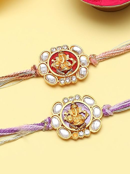 Elegant rakhi duo with stunning gold and purple beads, a meaningful gift for brothers on Raksha Bandhan.