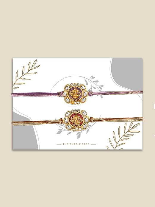 Two rakhi with gold and purple beads, symbolizing love and protection during the special occasion of Raksha Bandhan.