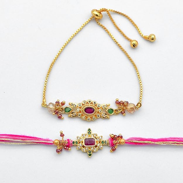 Two gold Rakhi featuring intricate pink and yellow floral designs, ideal for a dainty and charming look.