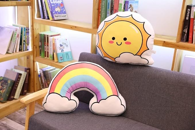 Two colorful pillows featuring a sun and a rainbow design, adding a touch of brightness and cheerfulness to any space.