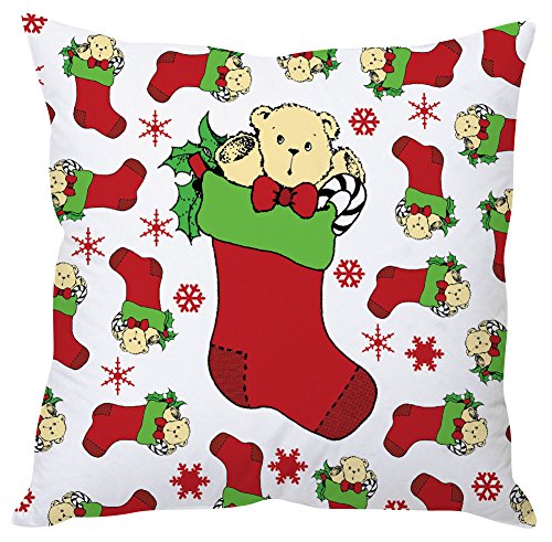 A festive Christmas pillow featuring a teddy bear beside a colorful stocking, evoking holiday warmth and cheer.

