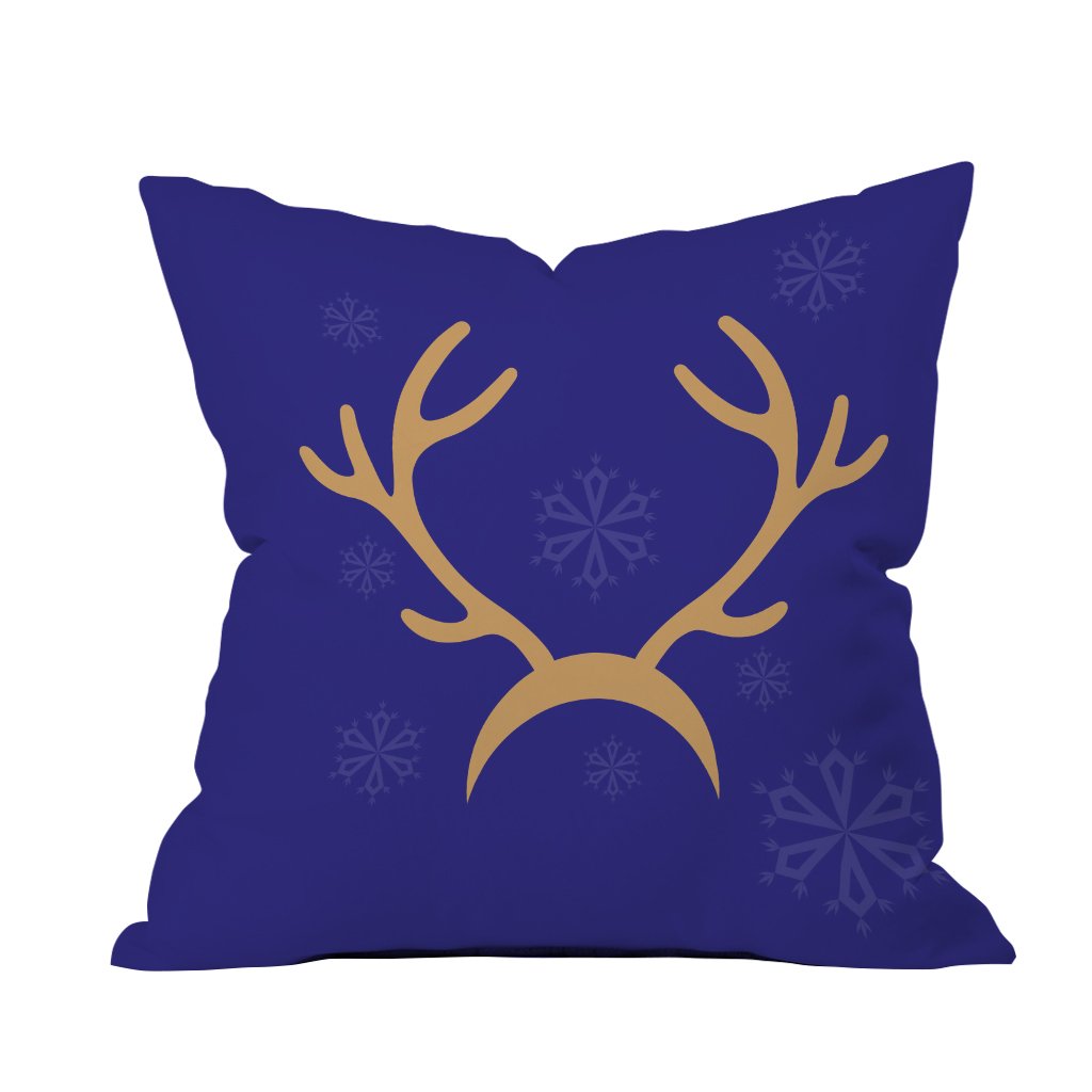 A blue pillow featuring a stylish gold deer head design, adding a touch of elegance to any decor.

