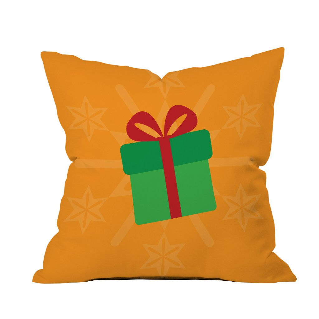  A festive Christmas gift pillow displayed against a vibrant orange background, adding warmth to the holiday decor.
