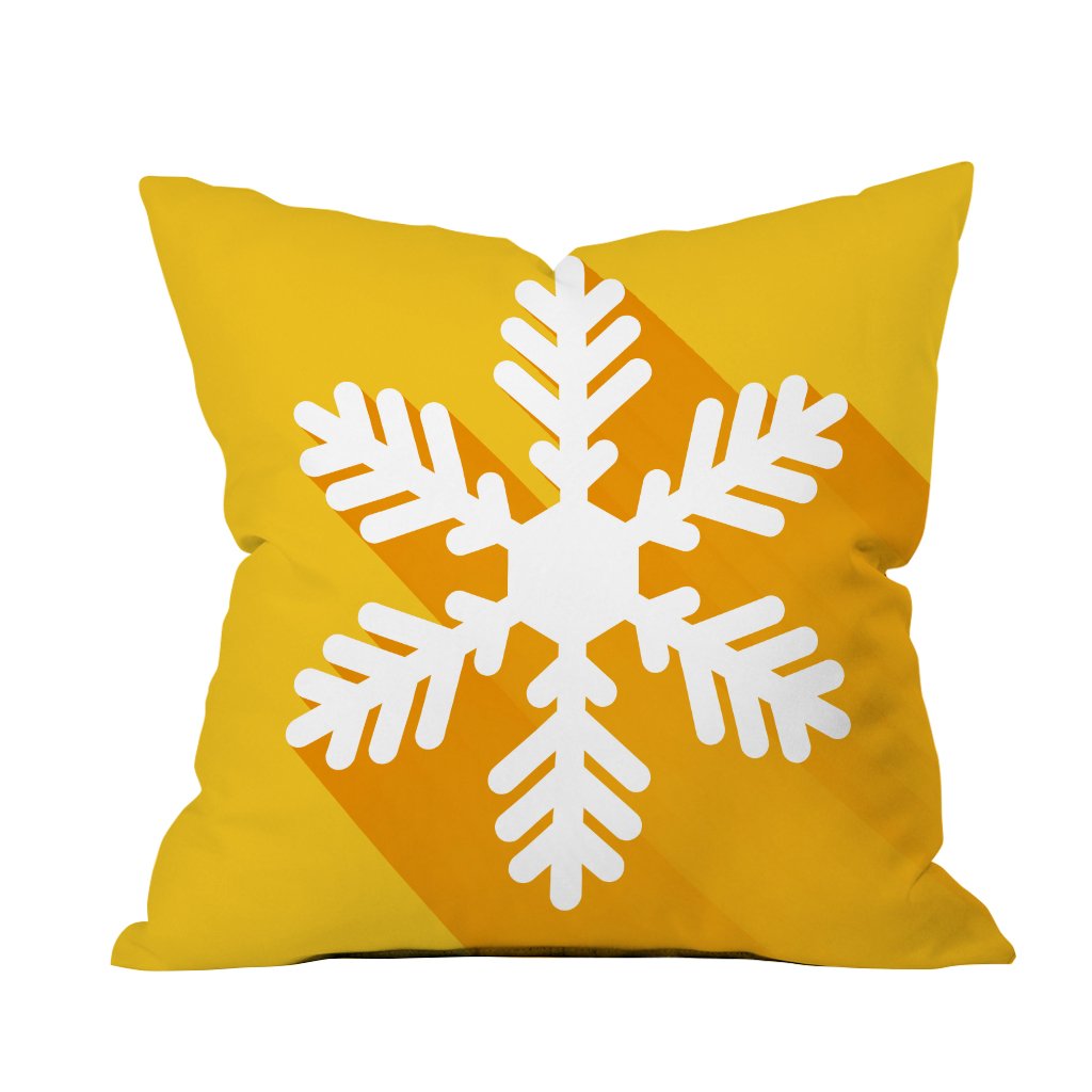 A yellow and white snowflake pillow resting on a clean white background, adding a touch of winter charm to the decor.

