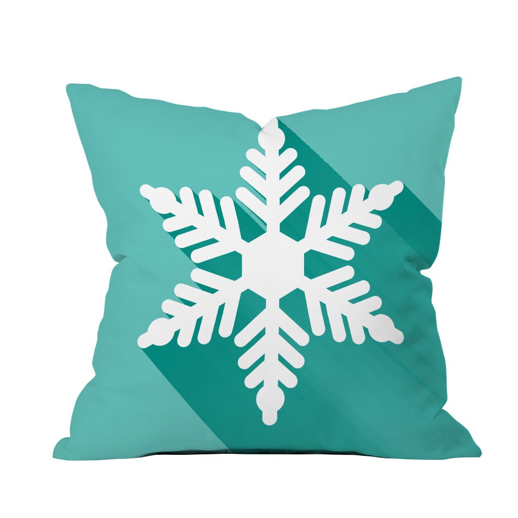 A decorative pillow featuring a delicate snowflake design, adding a touch of winter charm to any space.

