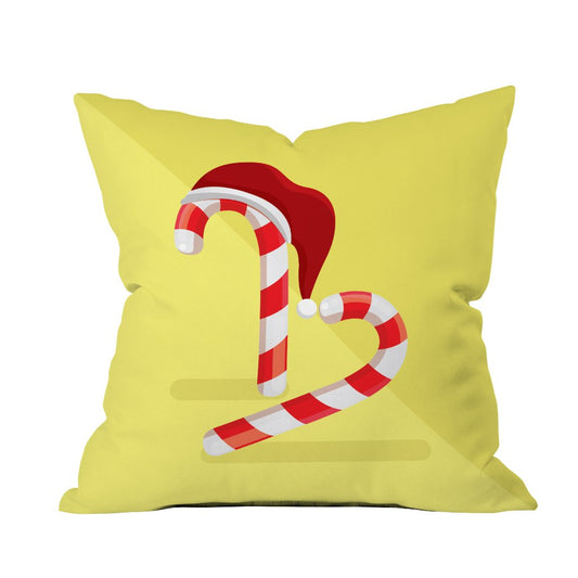 A decorative pillow featuring a festive candy cane design, perfect for holiday-themed decor.

