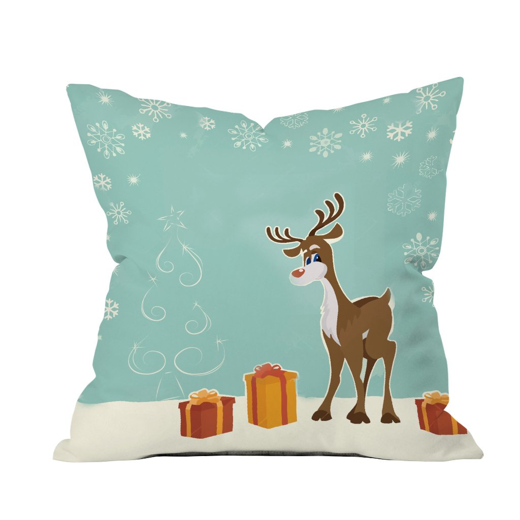 A decorative pillow featuring a reindeer surrounded by colorful presents, perfect for holiday-themed decor.

