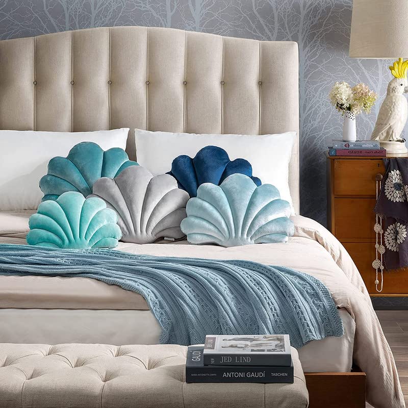 Array of pillows in a variety of colors, great for mixing and matching to suit your personal style.