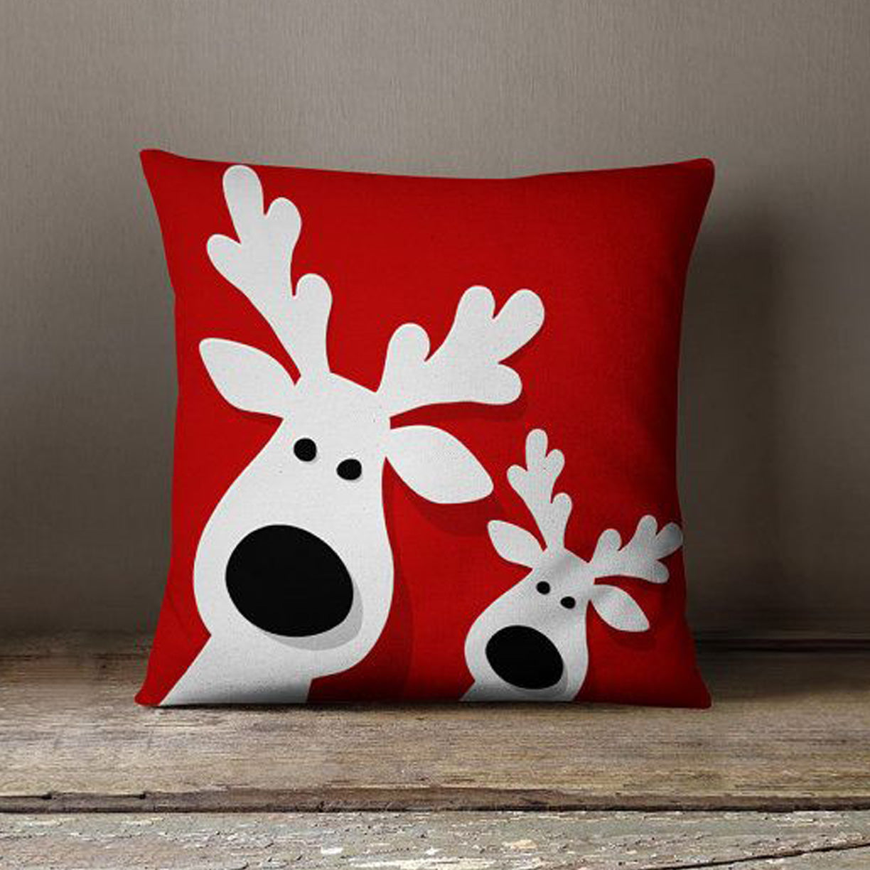 Festive reindeer print on cozy pillow.