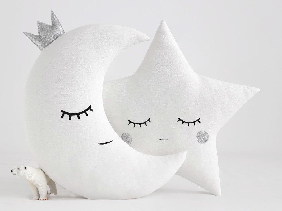 These adorable white pillows with blue eyes and a star on top will bring a fun and quirky vibe to your space.