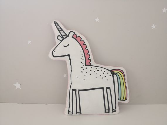 A cute unicorn pillow with a pink and blue tail, perfect for adding a touch of magic to any room!