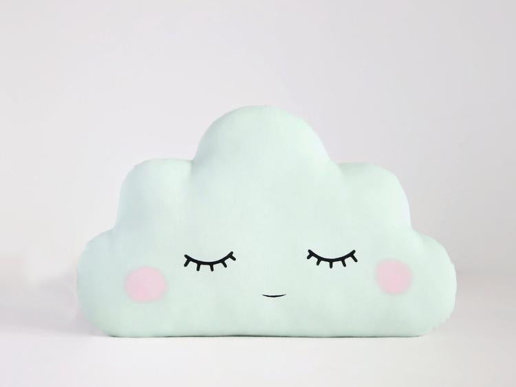 1. Fluffy cloud pillow with cute eyes and long eyelashes, perfect for a dreamy bedroom decor.