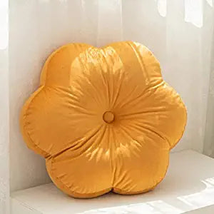  flower cushion on white table, adding a pop of color to your decor.