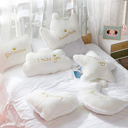 Soft white pillow with "Sweet Baby" text.