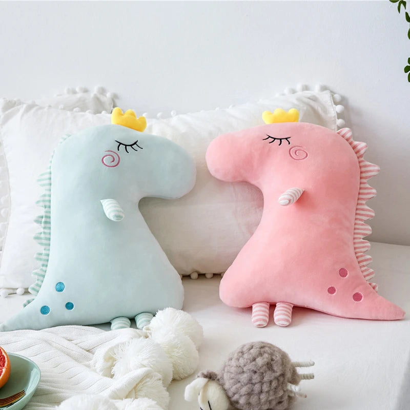 Two adorable stuffed animals with pink and blue heads, one holding a heart and the other holding a star, placed next to each other.