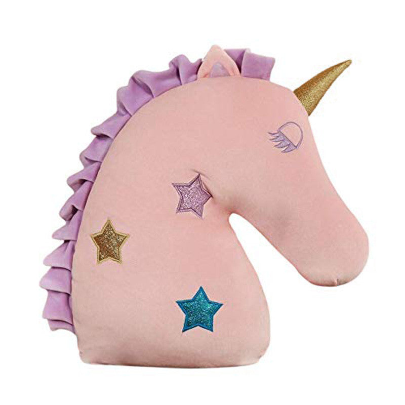 Pink unicorn head pillow with star pattern, perfect for adding a touch of magic to your bedroom decor.