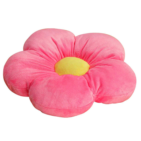 A pink flower-shaped cushion with a yellow center, perfect for adding a touch of beauty and comfort to any space.