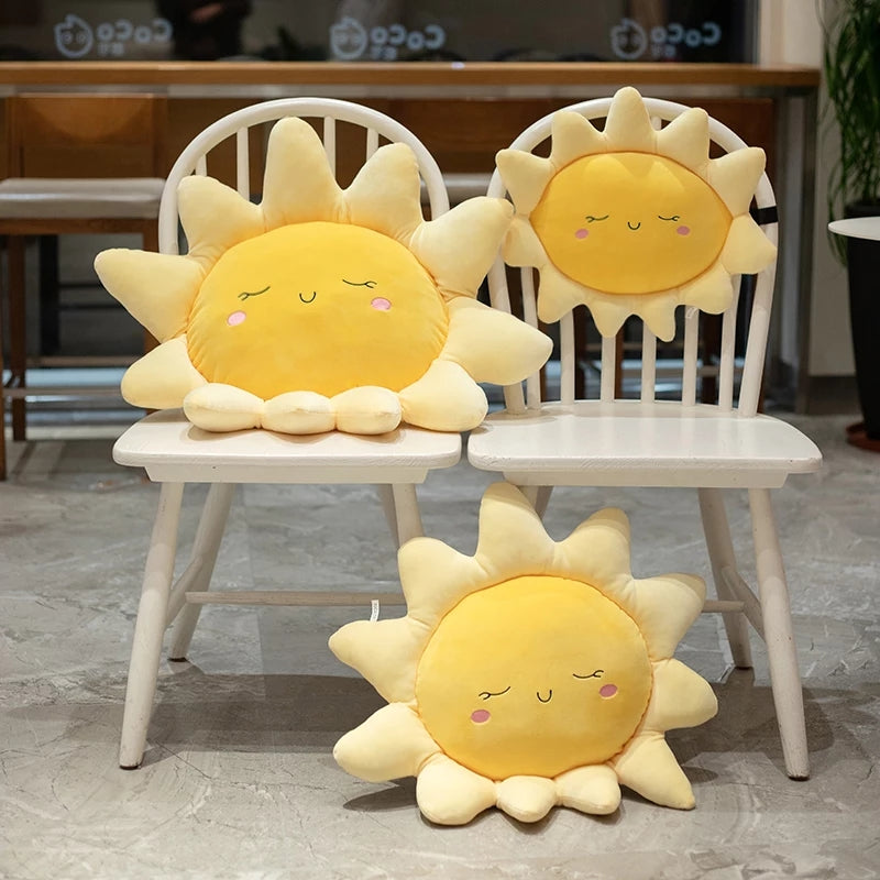 Cheerful sun pillow lounging on chair.