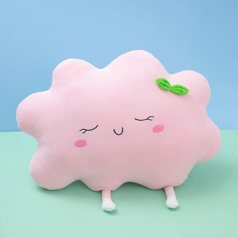 1. Pink cloud pillow with green bow, perfect for adding a touch of whimsy to your bedroom decor.