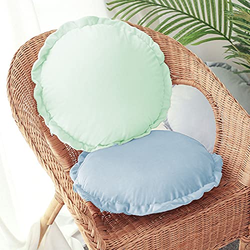 A round pillow adorned with blue and green ruffles, adding a touch of elegance and charm to any space.