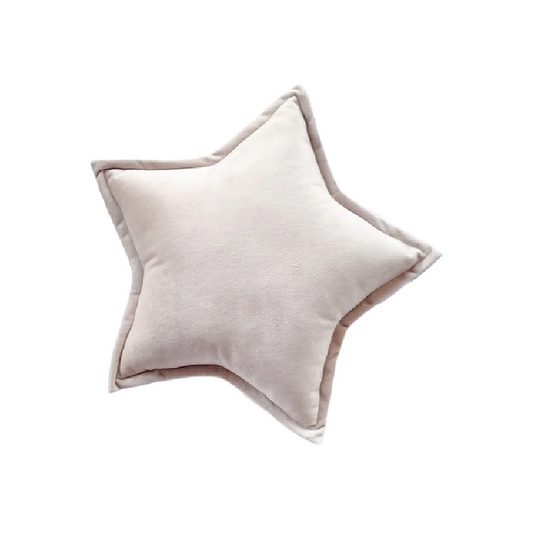 White pillow with star design, perfect for adding a touch of whimsy to your bedroom decor.