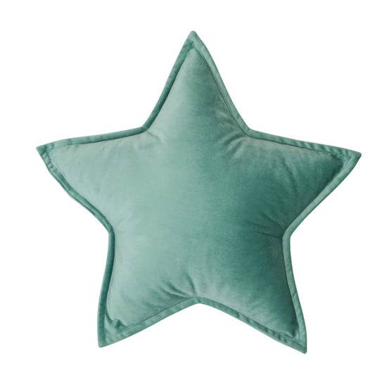 1. Green star pillow on white background, perfect for adding a pop of color to any room decor.