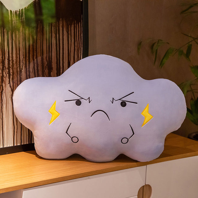  A cloud-shaped pillow with lightning bolts, perfect for adding a touch of whimsy to your home decor. 