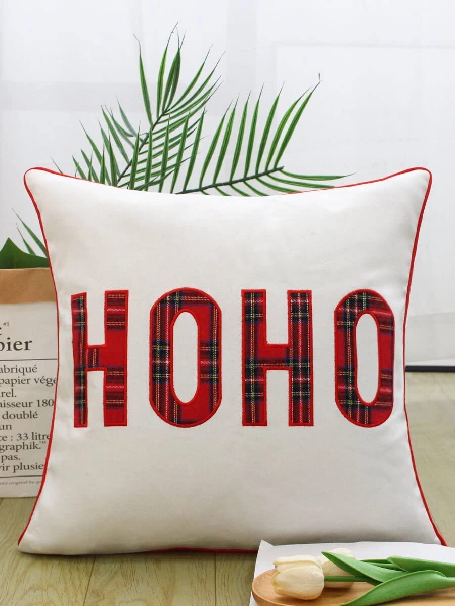 A chair with a pillow featuring the word "hoh" resting on it.