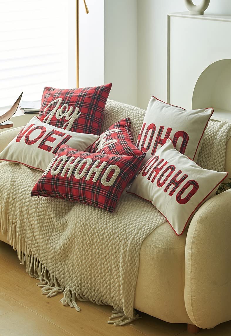 Christmas pillow with 'ho ho ho' print, a festive touch for the holiday season.