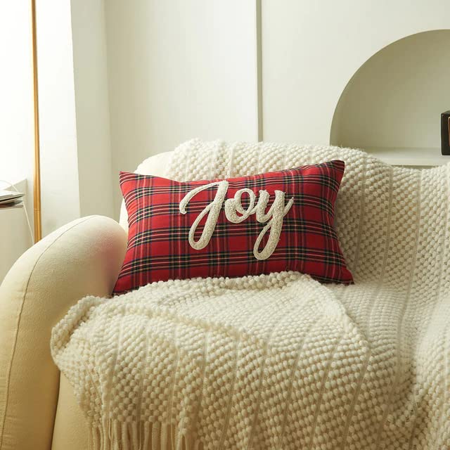 A vibrant plaid pillow that brings joy to any space with its cheerful colors and cozy texture.