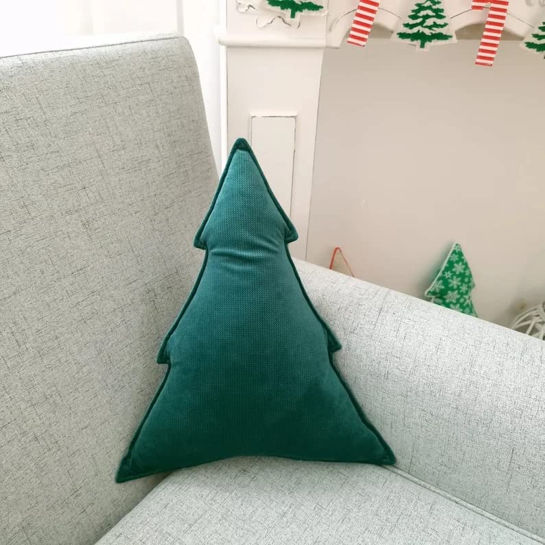 2. Two festive green trees on a couch.