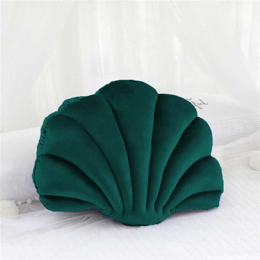  pillow with a shell shape, adding a touch of elegance and comfort to any space.