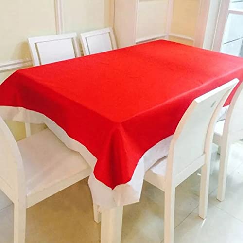 Elegant table set with red and white Christmas tablecloths, perfect for holiday gatherings.