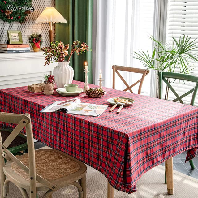  Red and black plaid tablecloth adorned with a festive Christmas tree.