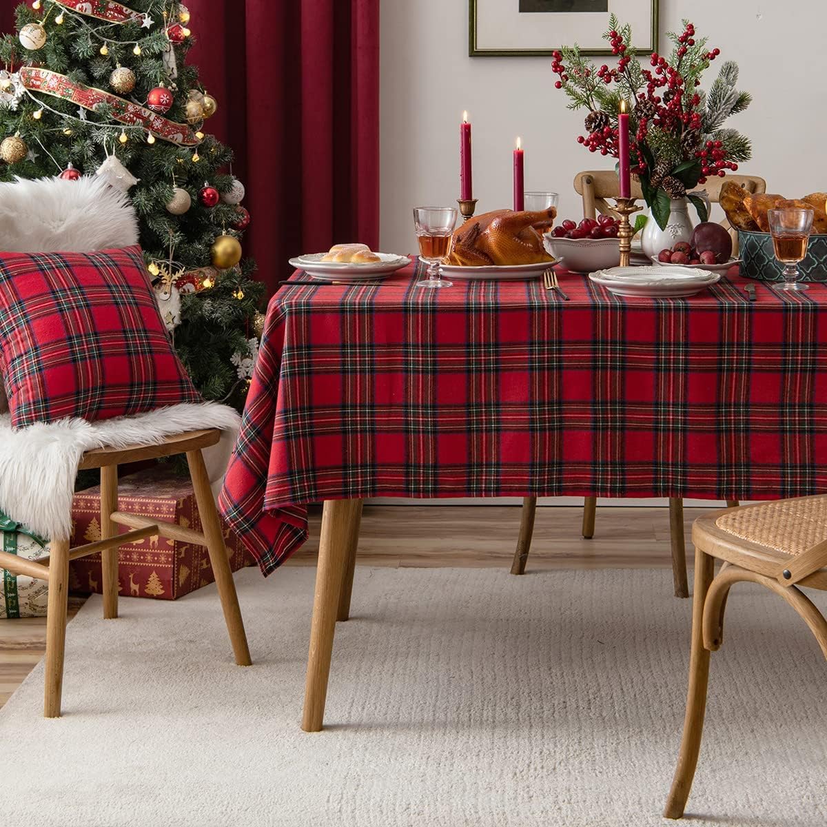  Christmas-themed table setting with red and black plaid tablecloth.