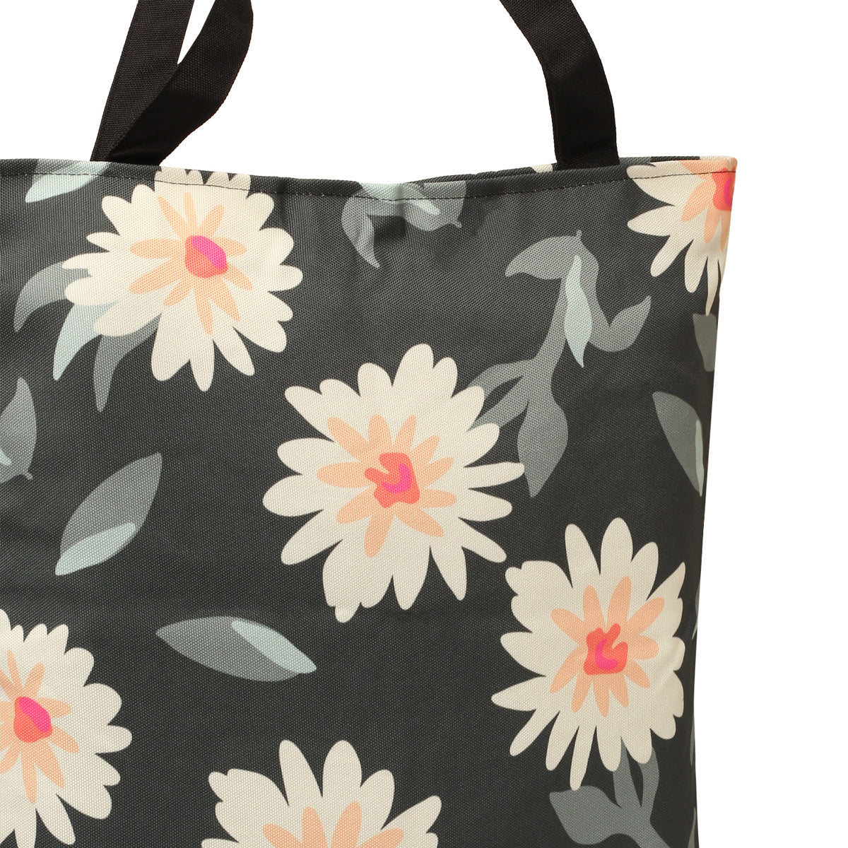 A tote bag with a black and white floral pattern, perfect for adding a touch of elegance to any outfit.