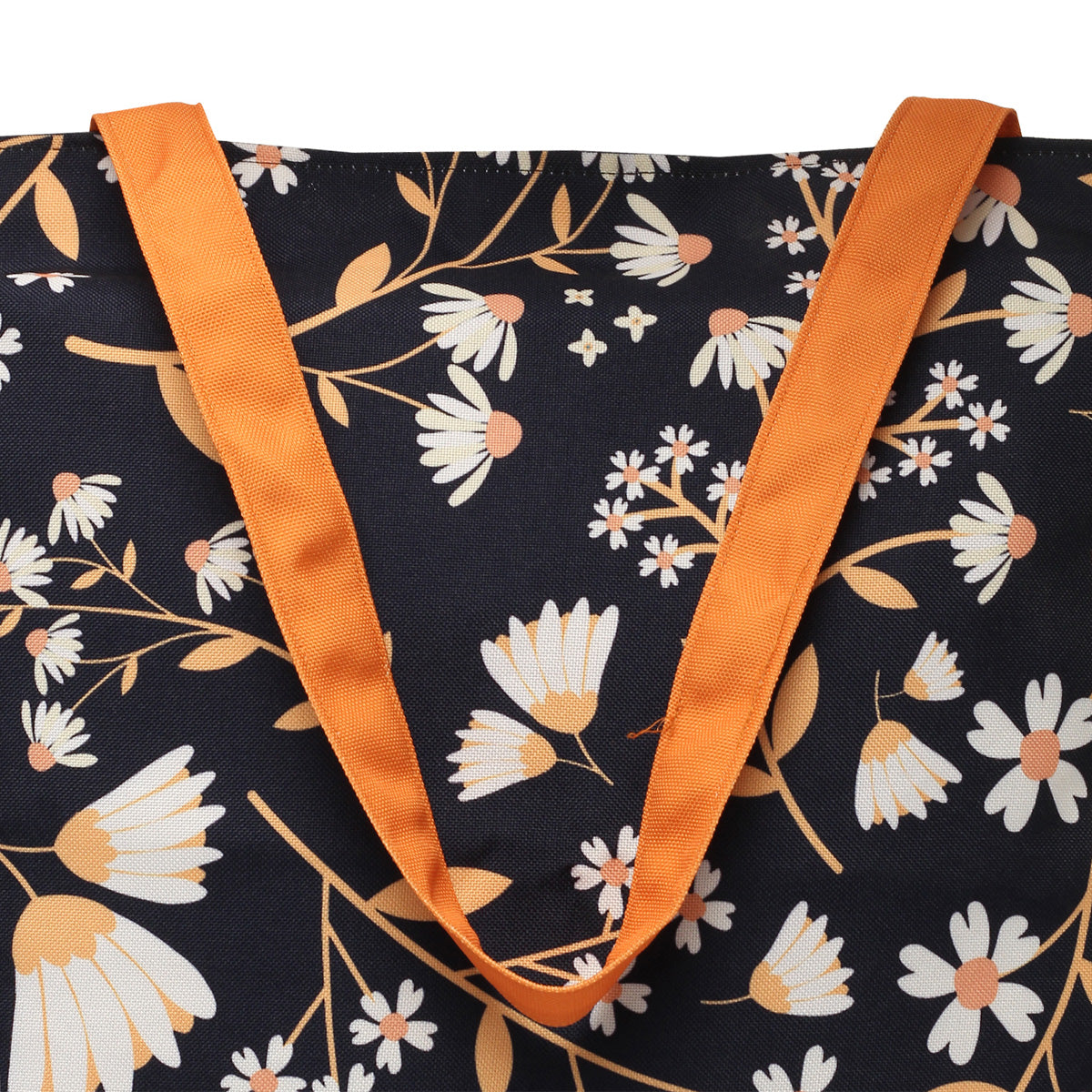 zoom view of Tote bag featuring colorful flowers and orange straps.