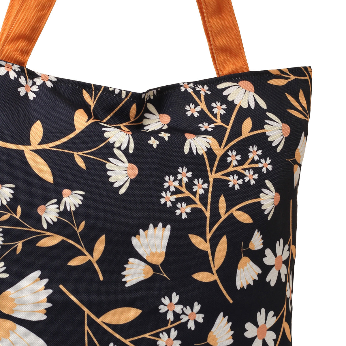 A stylish tote bag adorned with flowers and bright orange handles.