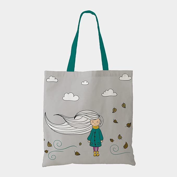 A light grey tote bag with teal straps with a cute girl print 